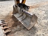 a bulldozer that is sitting in the dirt