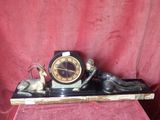 a clock that is sitting on top of a table