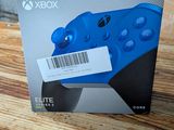 a box with a game controller on it sitting on a table