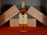 a bottle of wine that is sitting on a table