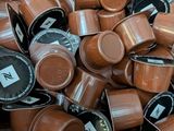 a box full of coffee cups sitting on a table