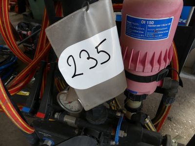 a close up of a pink fire hydrant with a price tag on it