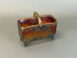 an image of a small box with a ring on it