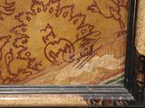 a picture of a painting on the wall of a room