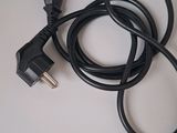 a black cord that is connected to a power cord