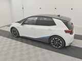 an image of a white car parked in a garage