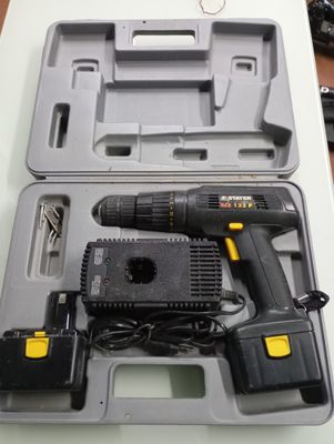a tool in the case that is sitting on the table