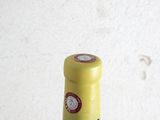 a bottle of wine that is sitting on a table