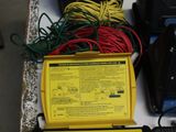 many different types of electronic equipment on a table