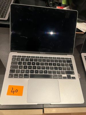 two laptops that are sitting on a table