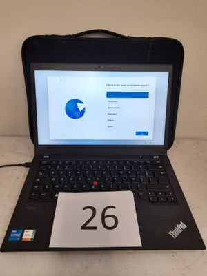 un ordinateur portable dont l'écran affiche le chiffre 26