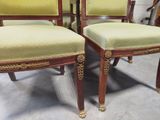 two chairs that are sitting next to each other