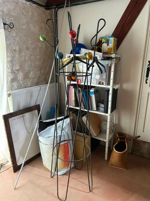 a picture of a room with a rack of scissors and other items
