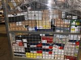 a large metal cage filled with assorted items