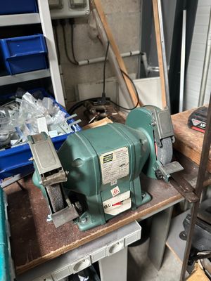 a machine that is sitting on a table in a garage