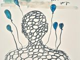 drawing of a man with blue balloons in his head