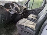 a car that has a steering wheel and a leather seat in it