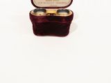a small box that has a pair of glasses in it