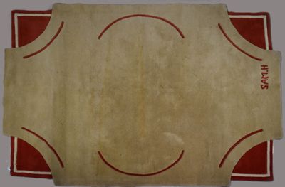 Grand TAPIS design à décor géométrique dans les tons rouges …