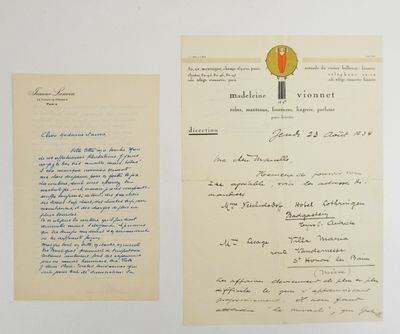 an old letter and a piece of paper on a white surface