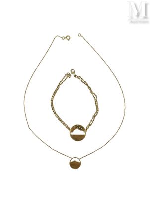 necklace and bracelet set with a gold disc and a chain