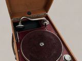 a wooden case with a record player inside of it