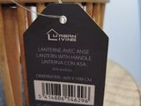 a tag on a wooden chair that says living