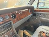 a dashboard of a car with a bunch of items in it