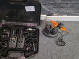 a tool kit that is sitting on the floor next to a wall