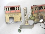 two toy trains that are sitting on a table