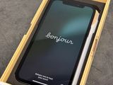 iphone x box with box open showing the back side of the phone