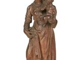 statue en bois représentant une femme tenant un enfant dans ses bras et coiffée d'une couronne