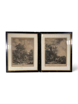 two framed prints of a man riding a horse and a woman riding a horse