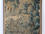 an image of a tapestry hanging on a wall in a room