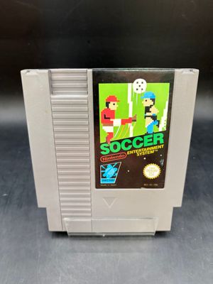un vieux jeu Nintendo avec un footballeur sur la jaquette