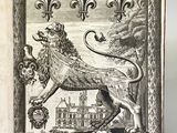 un vieux livre dont la couverture est ornée d'une illustration représentant un lion