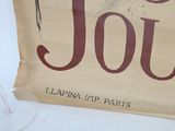 a sign that says joul on the side of a table