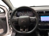 the interior of a car with a steering wheel and dashboard