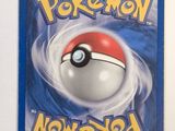 a close up of a pokemon card with a red and white ball on it
