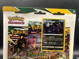 two pokemon trading cards in a display case on a black surface