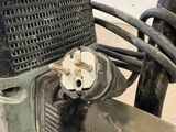 a close up of a machine that is on the ground