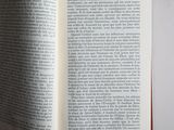a open book on a table that has a picture on it