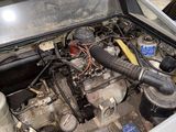 a car that has a engine in the back of it