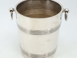 silver plated ice bucket with handles and handles on a white background