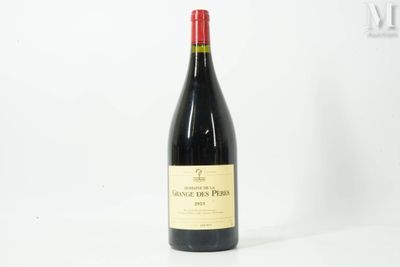 a bottle of wine that is sitting on a table