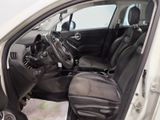 the interior of a white car with black leather seats and a steering wheel