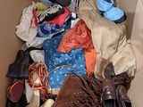 a box full of clothes and shoes in it