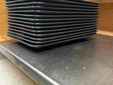 a stack of plates sitting on top of a counter