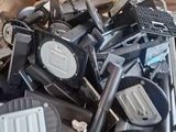 a large pile of assorted appliances in a box
