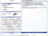 a close up of a document with a picture of a car on it